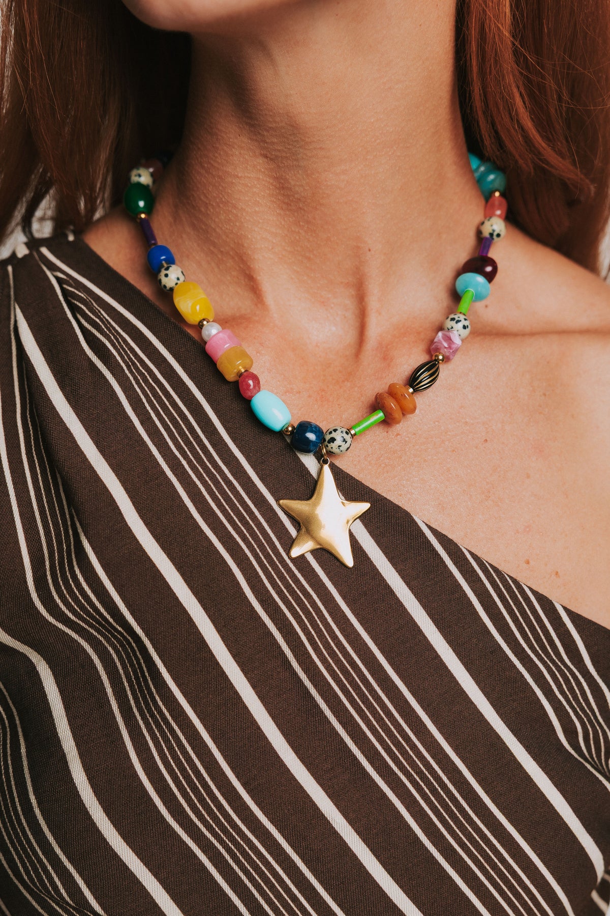 multicolor gemstone necklace with star pendant