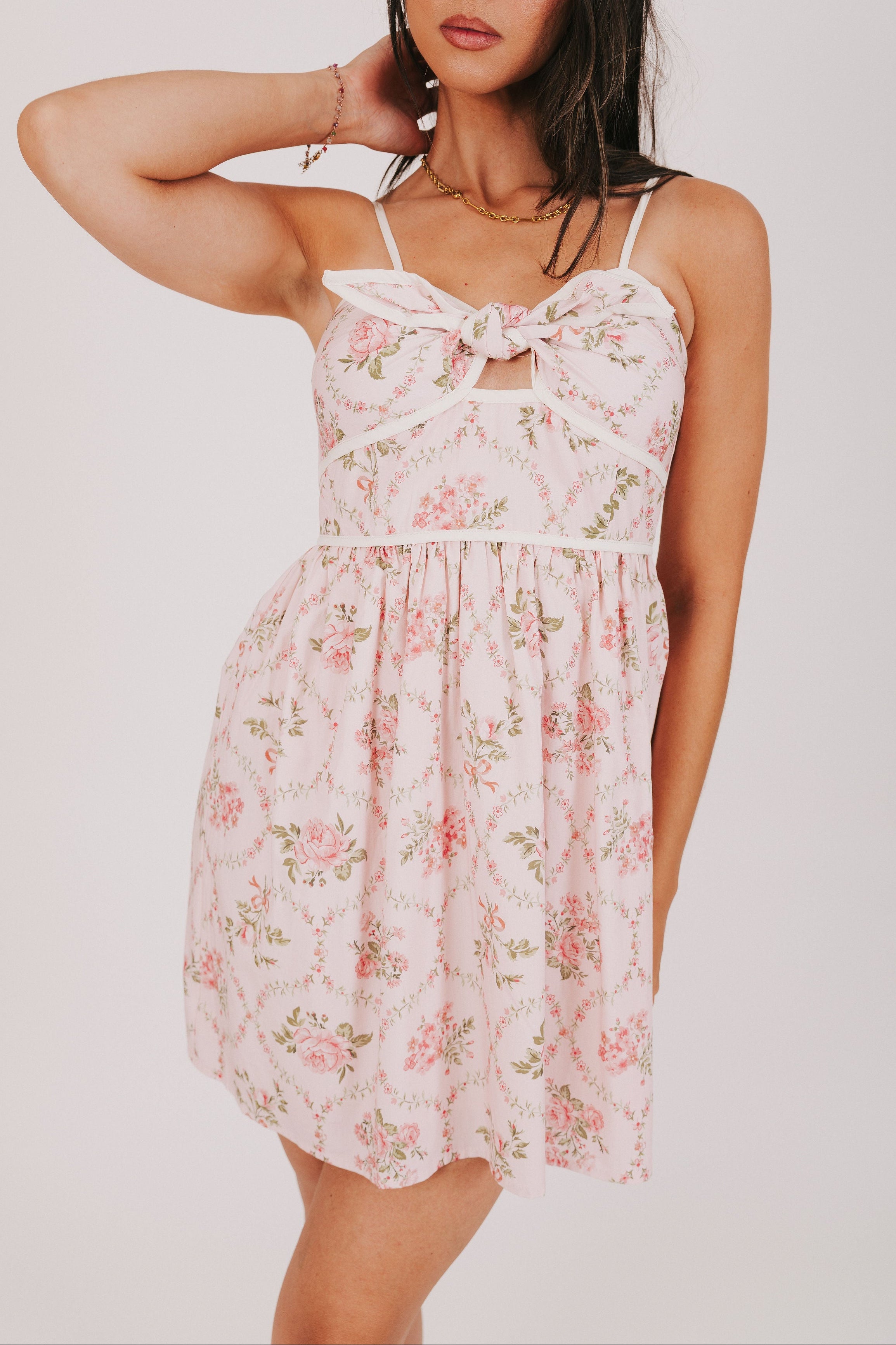 pink floral dress with keyhole and tie accent front