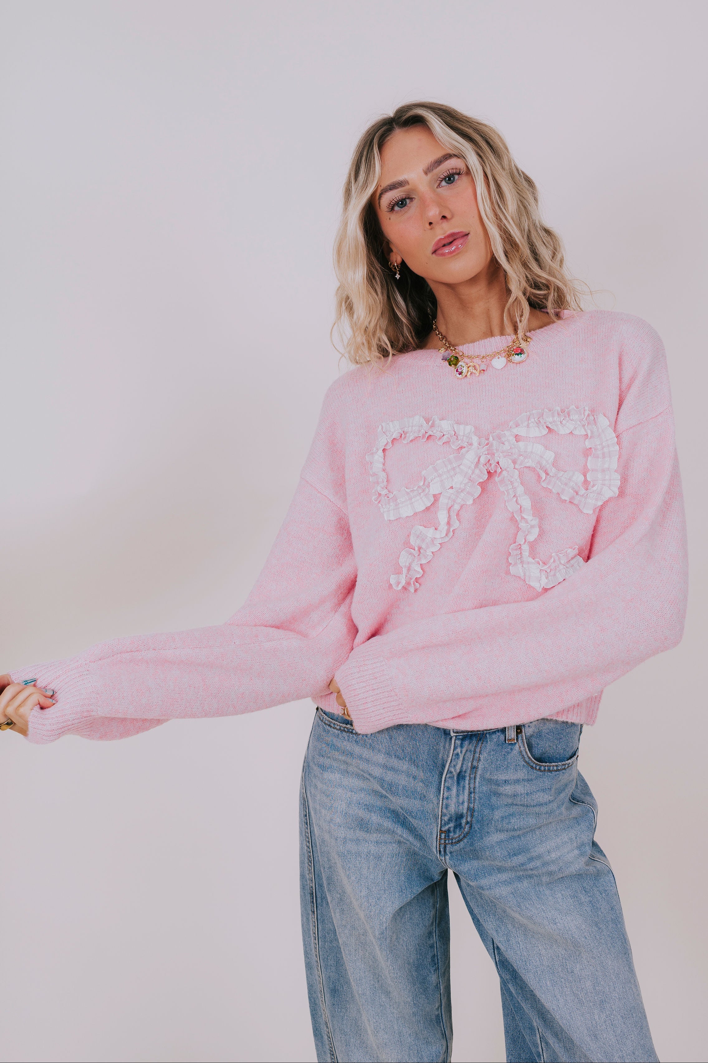 pink plaid ruffle bow sweater front