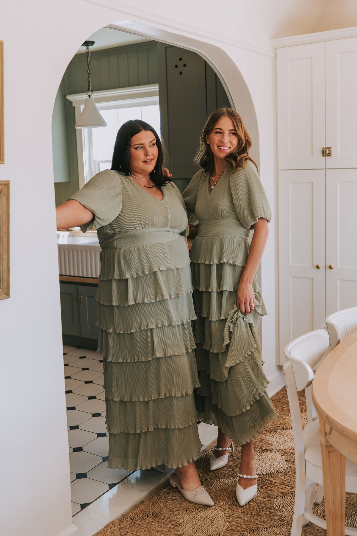 pleated tiered v neck maxi dress with puff sleeves sage lifestyle models 