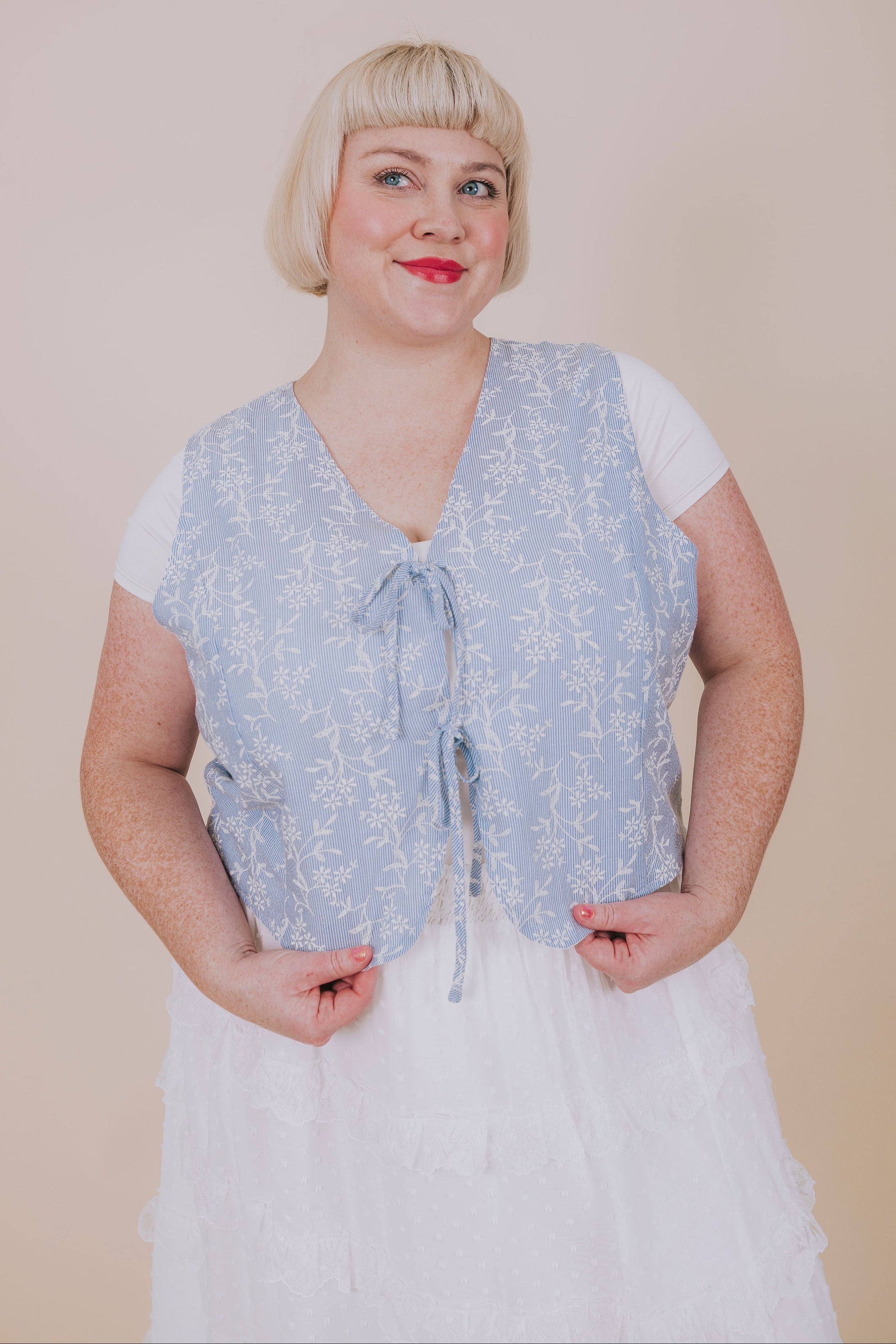 plus size blue and white striped floral vest front