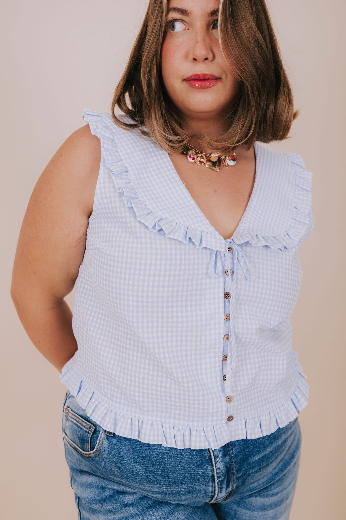 plus size blue gingham ruffled blouse detail