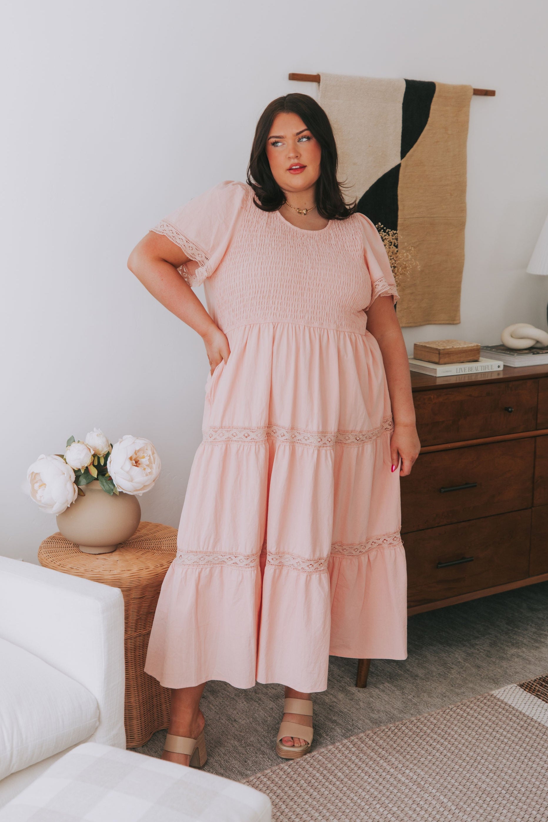 plus size pink smocked midi dress model