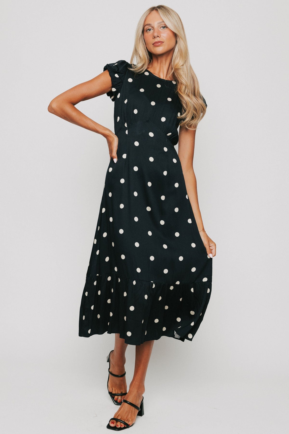 polka dot midi dress with puff sleeves black 