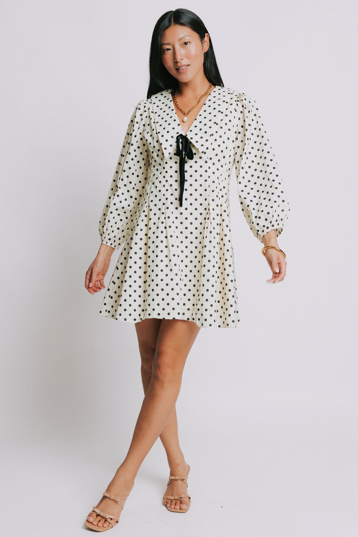 polka dot mini dress with v neck and long puff sleeves