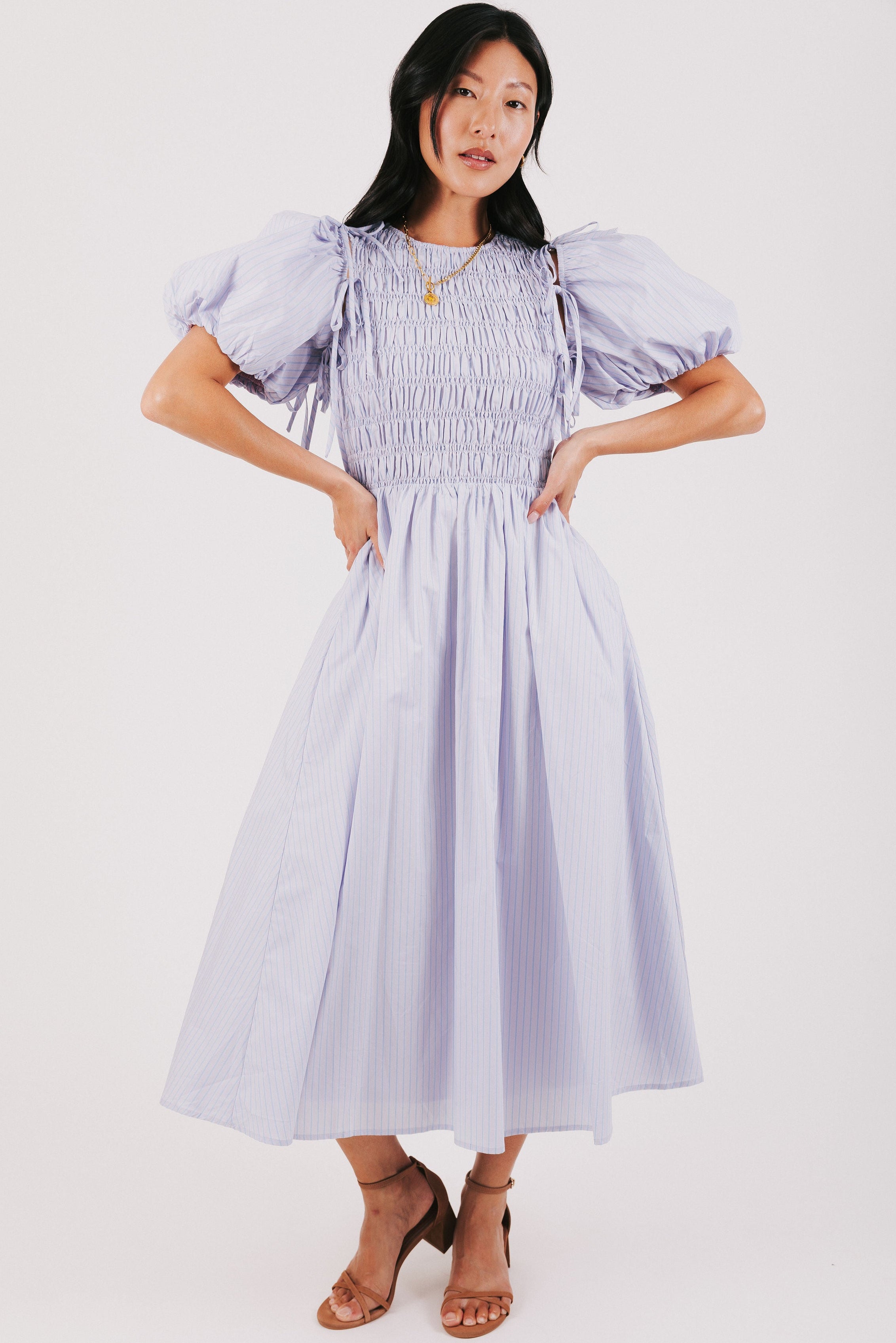 purple and blue striped dress with detachable puff sleeves