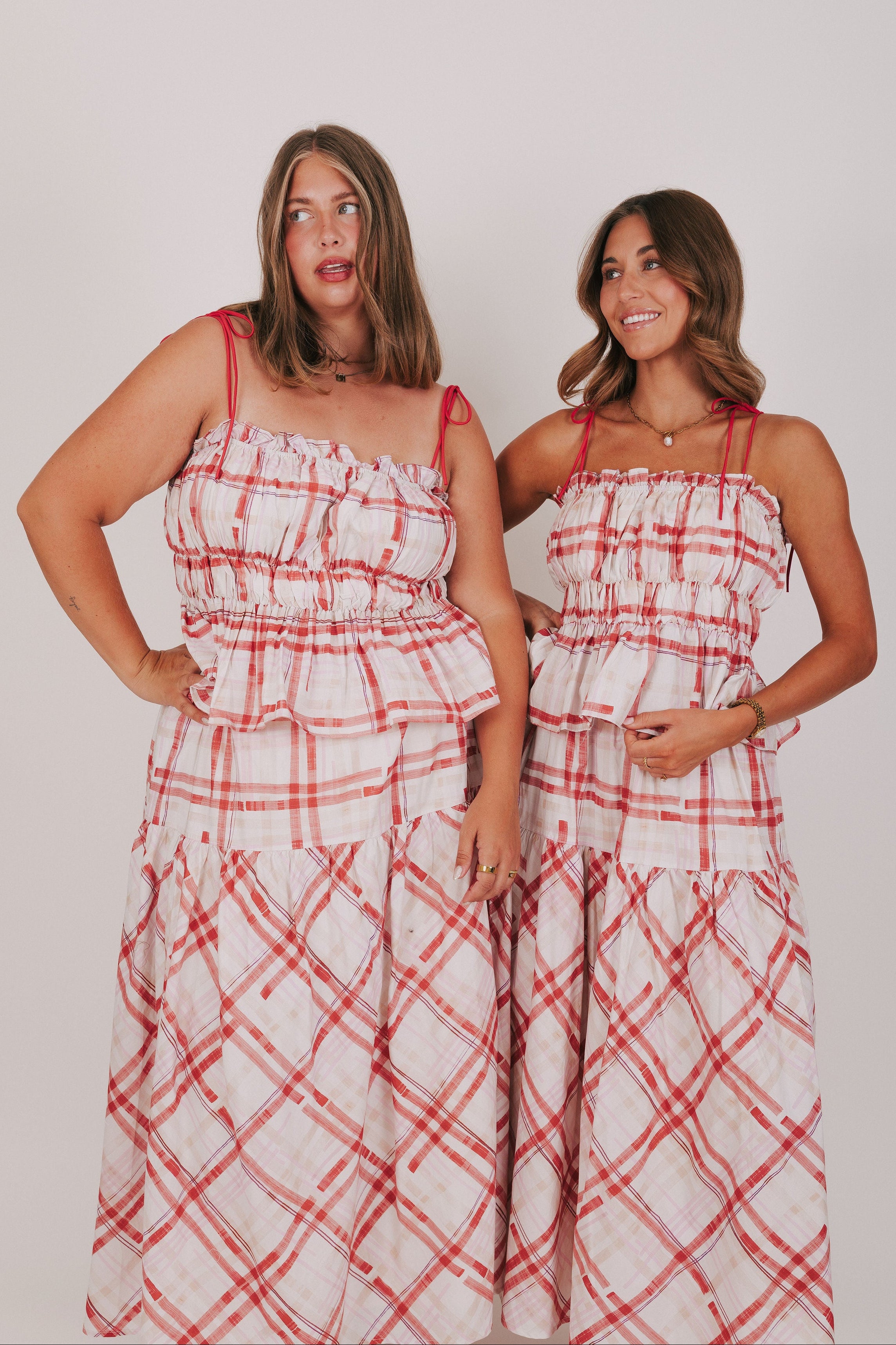 red and white plaid smocked top with ruffled trim models