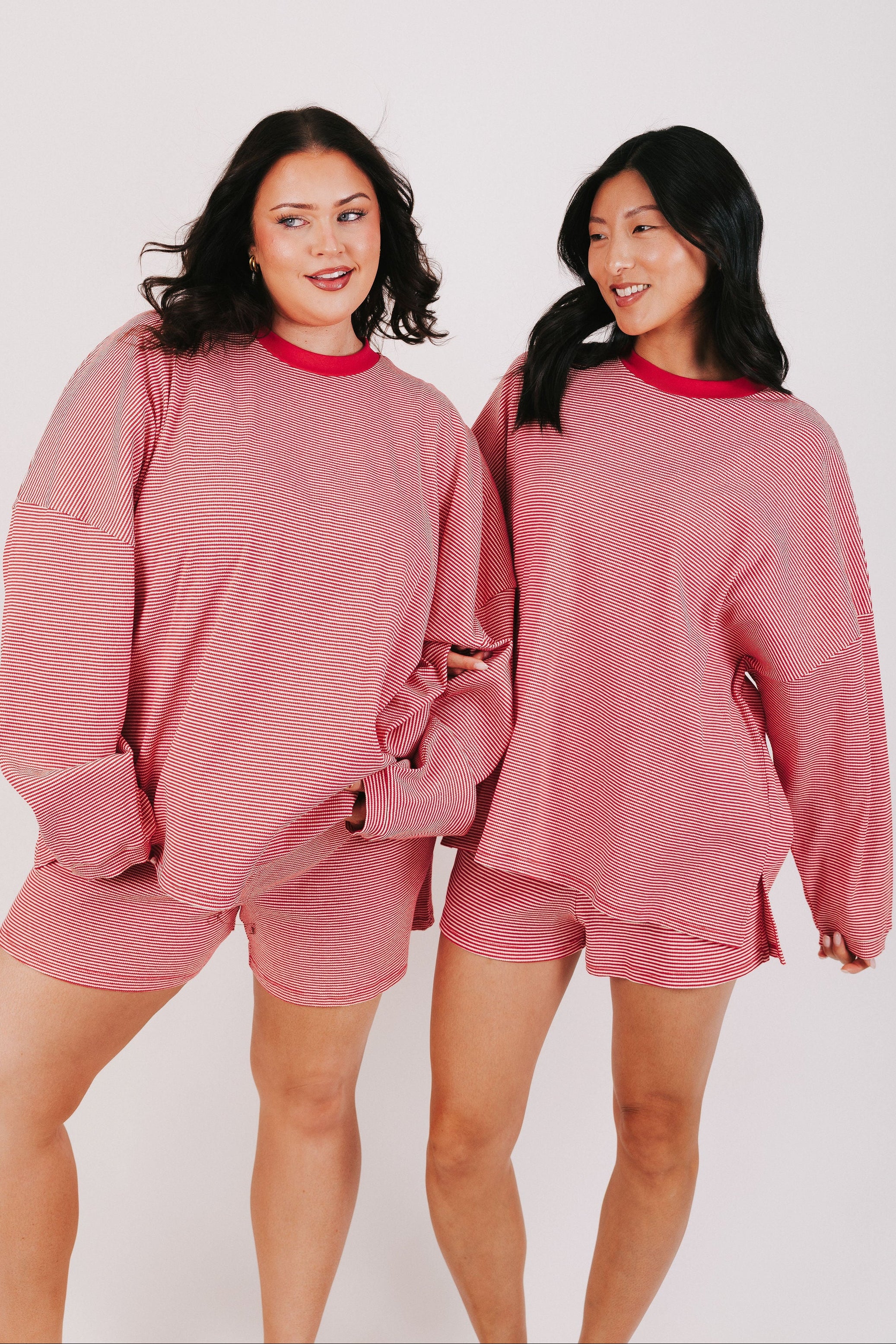 red and white striped oversized long sleeve top models