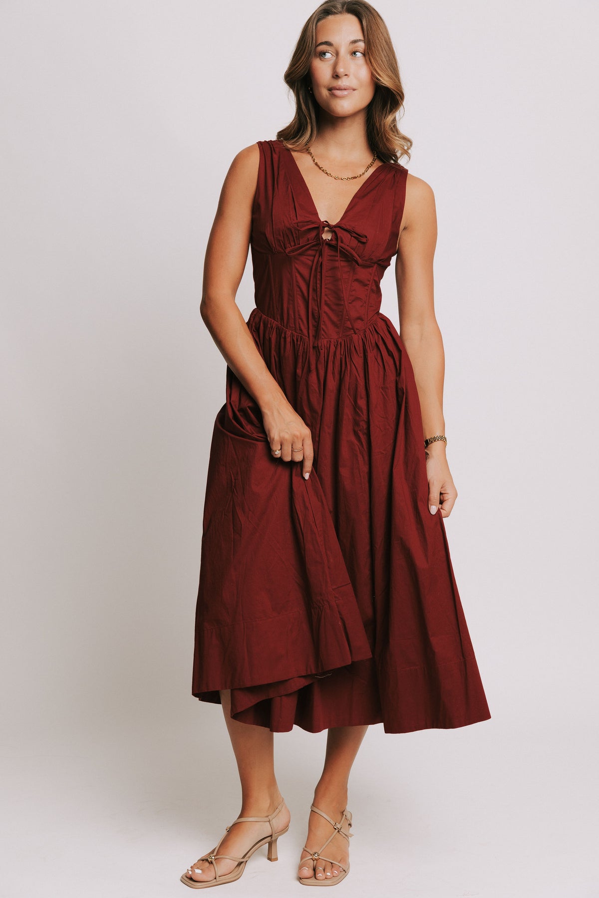 red midi dress with structured bodice front