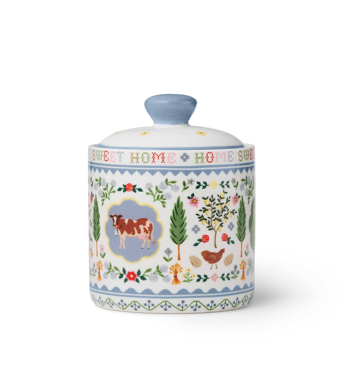 Decorative ceramic jar with farm animal illustrations and 'Sweet Home' text on a white background
