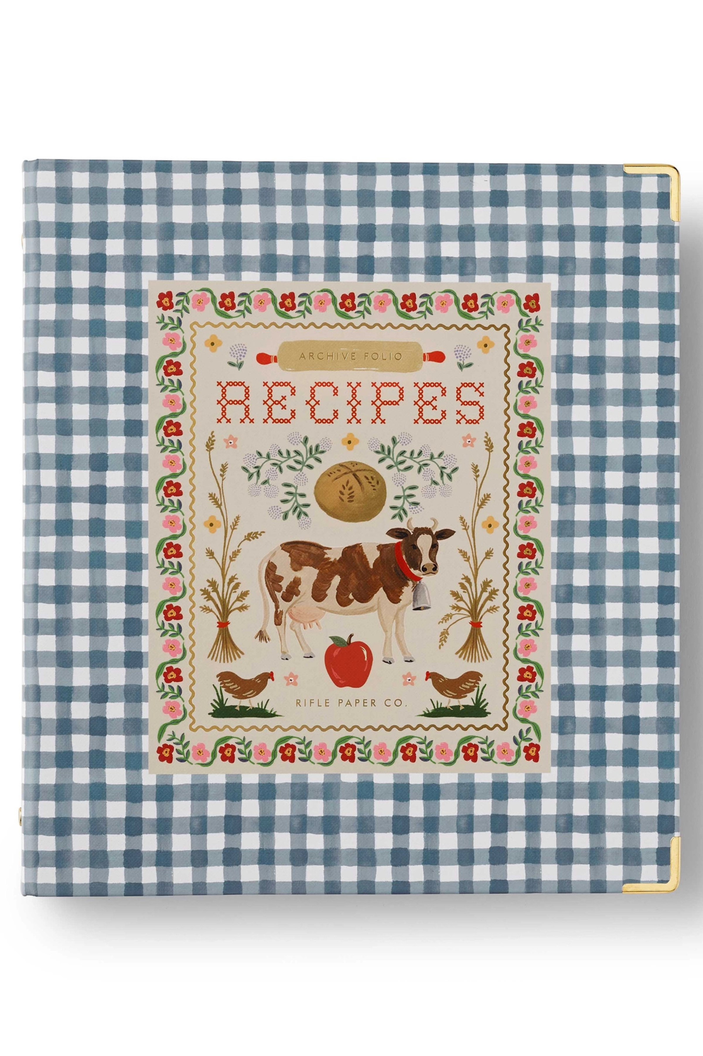 Recipe book with a cow illustration on a blue checkered background