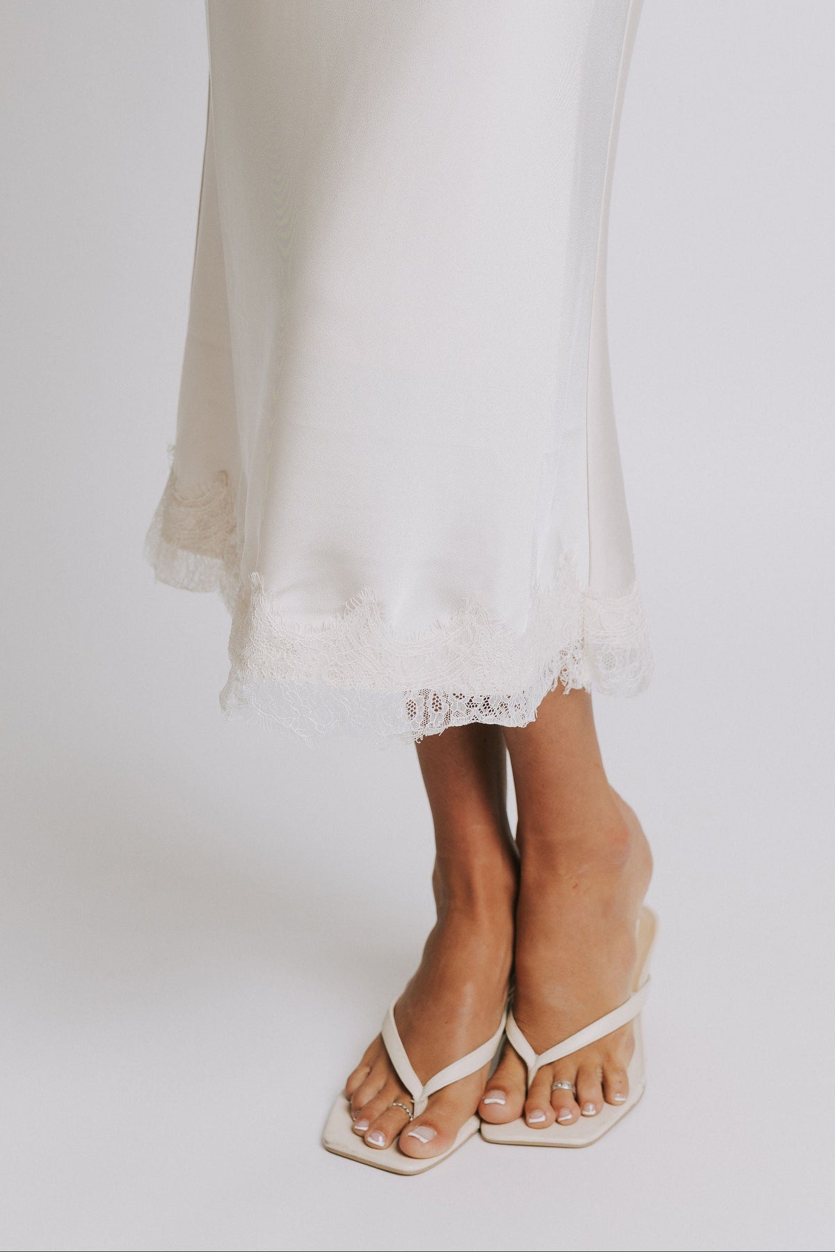 satin midi skirt with lace trim hem