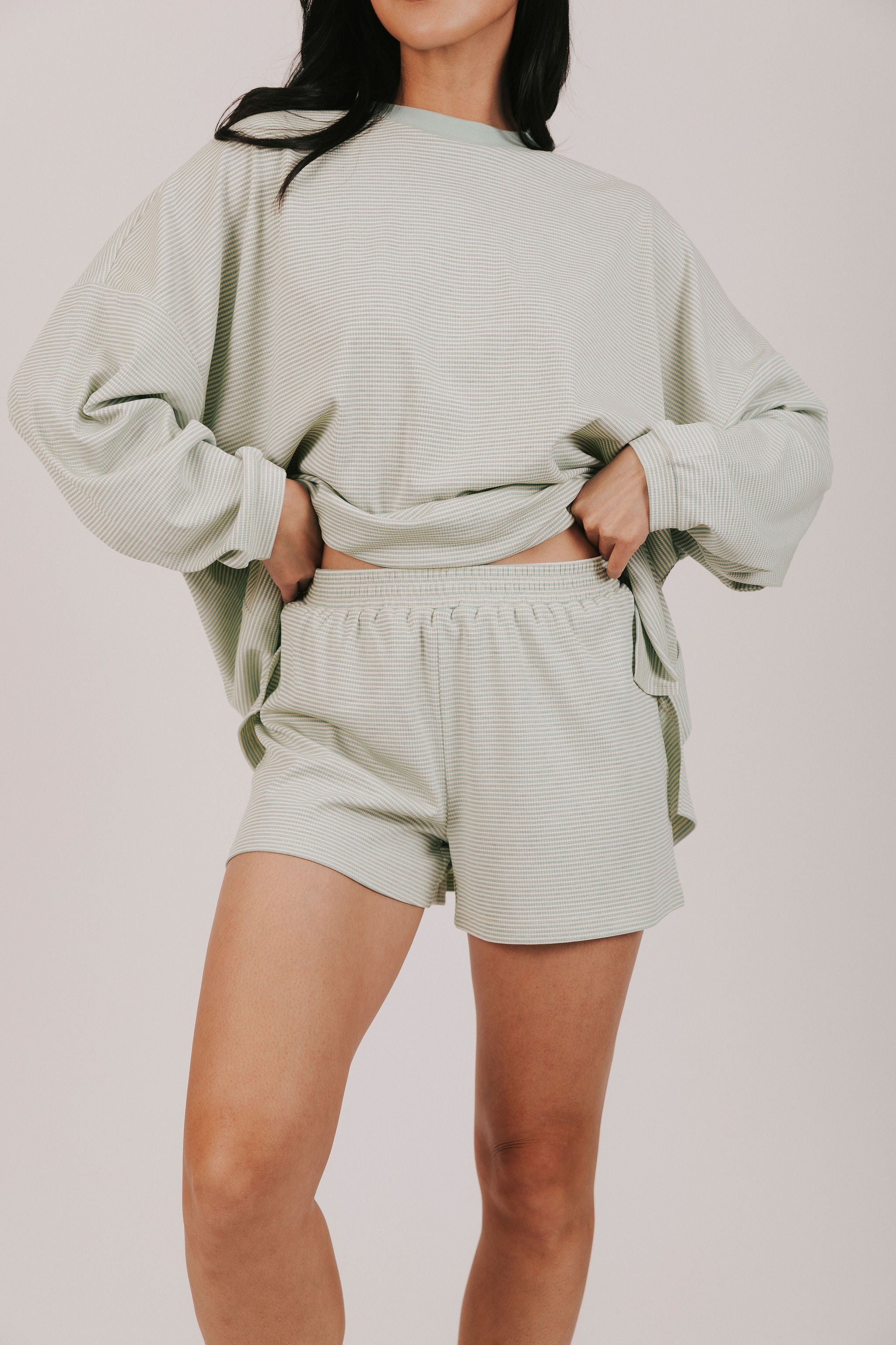 Horizontal striped lounge shorts with an elastic waistband and ribbed material 