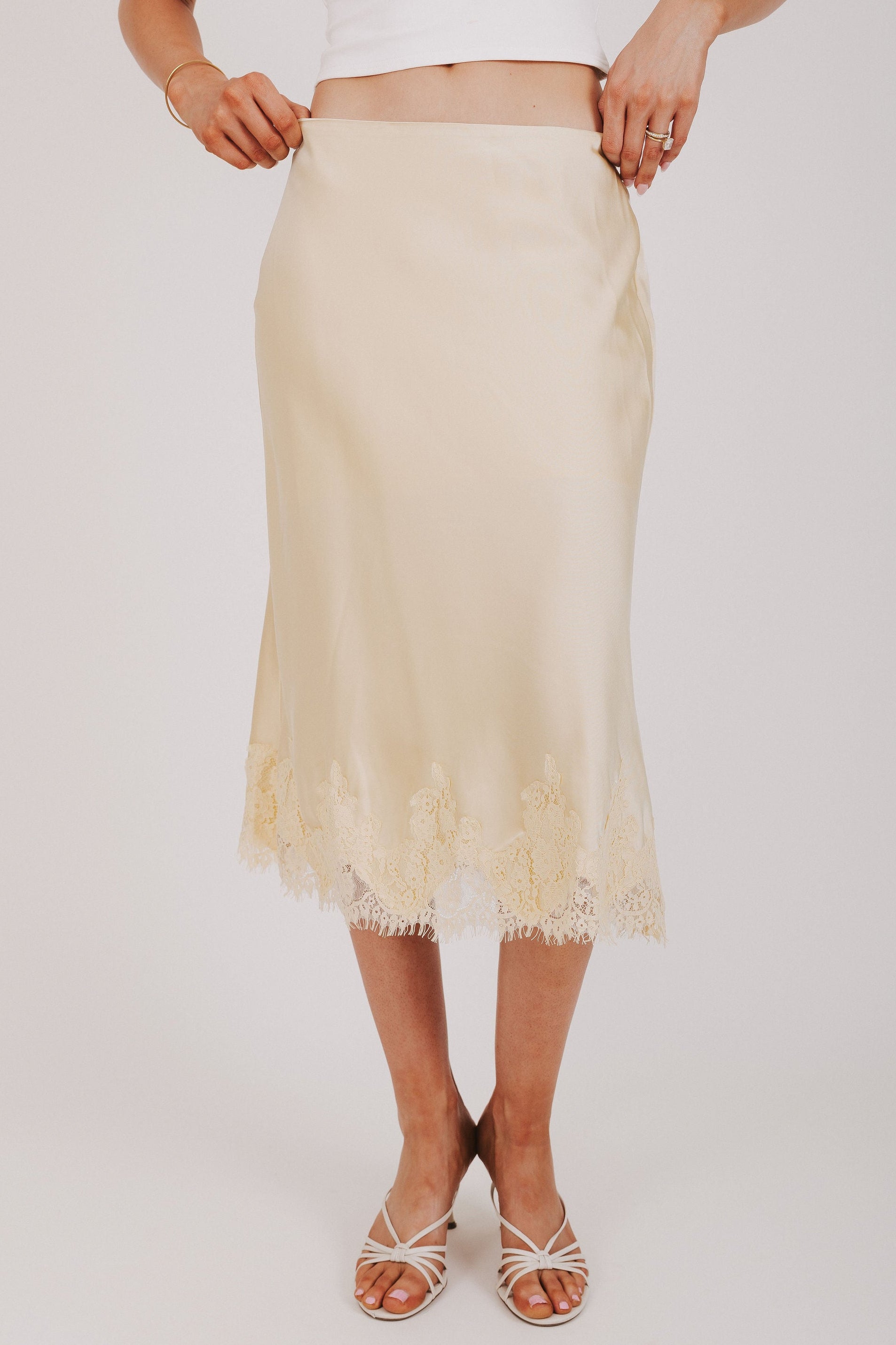 butter yellow satin midi skirt with lace trim