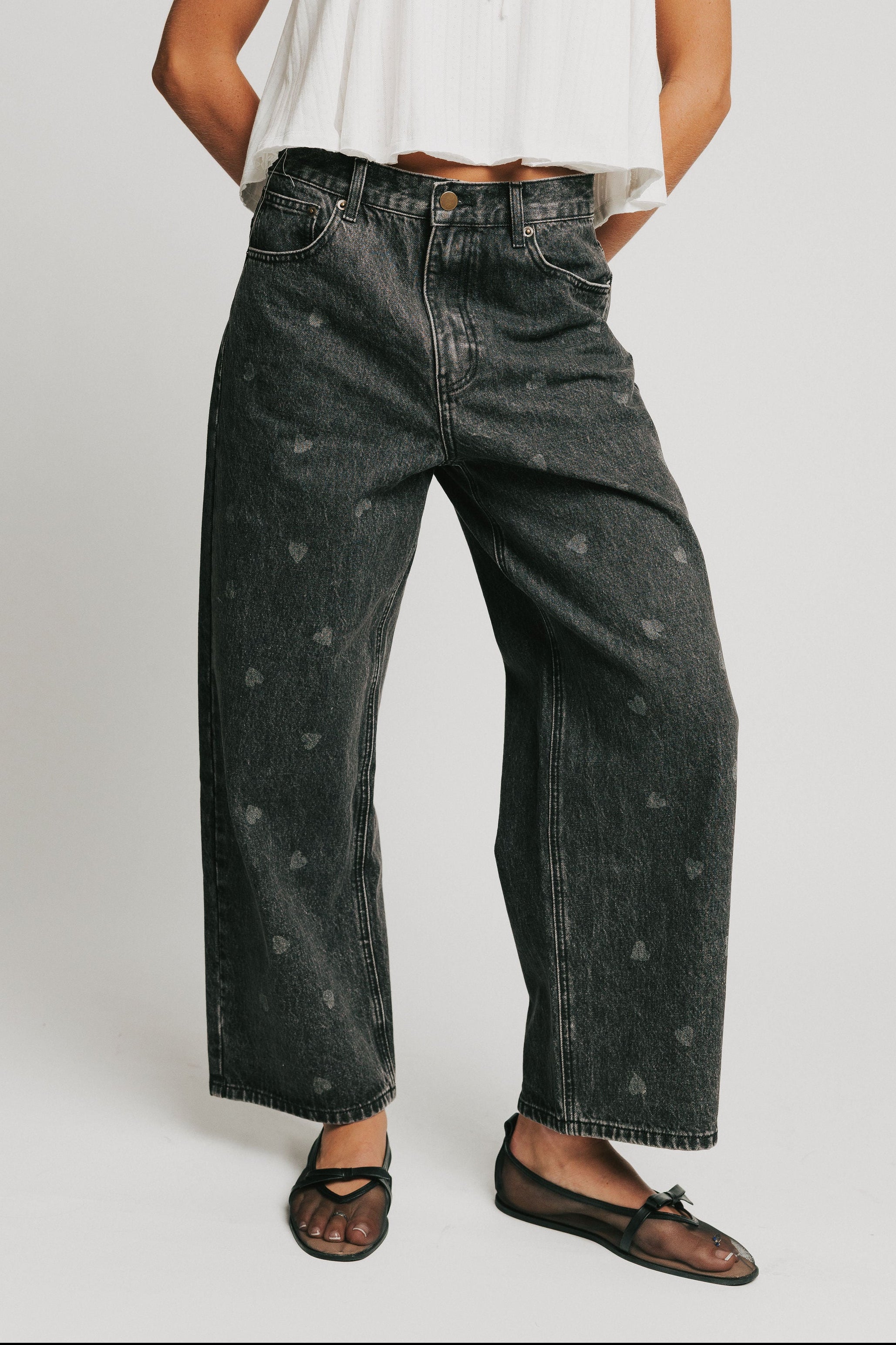 washed black barrel jeans with heart print