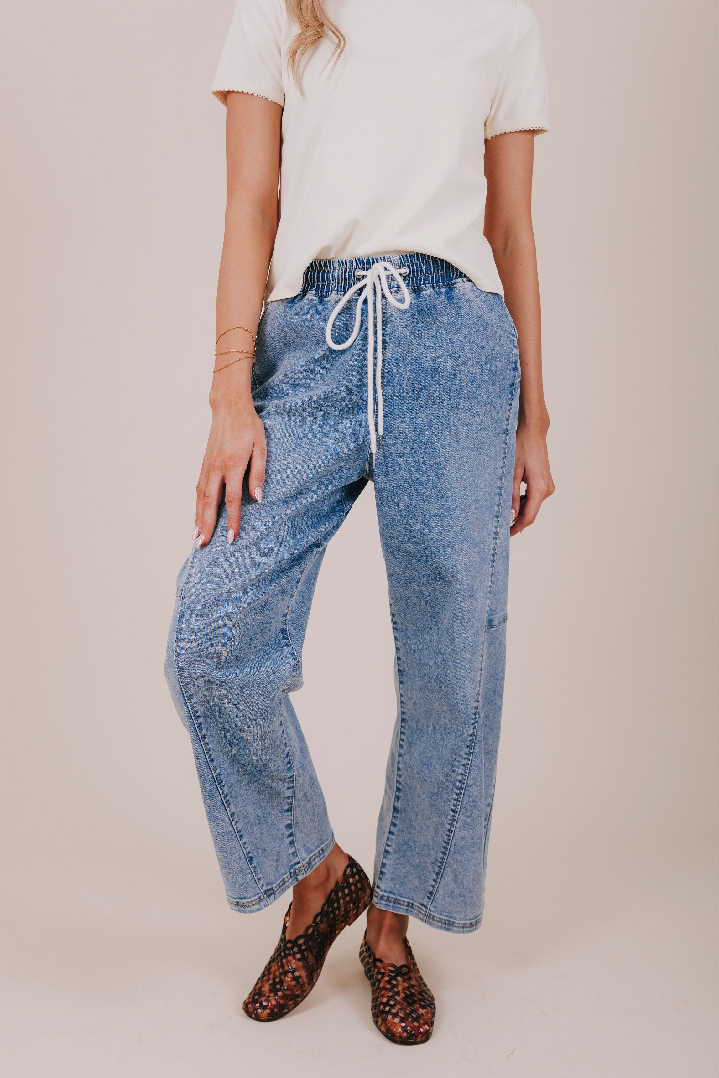 washed denim drawstring barrel jean front