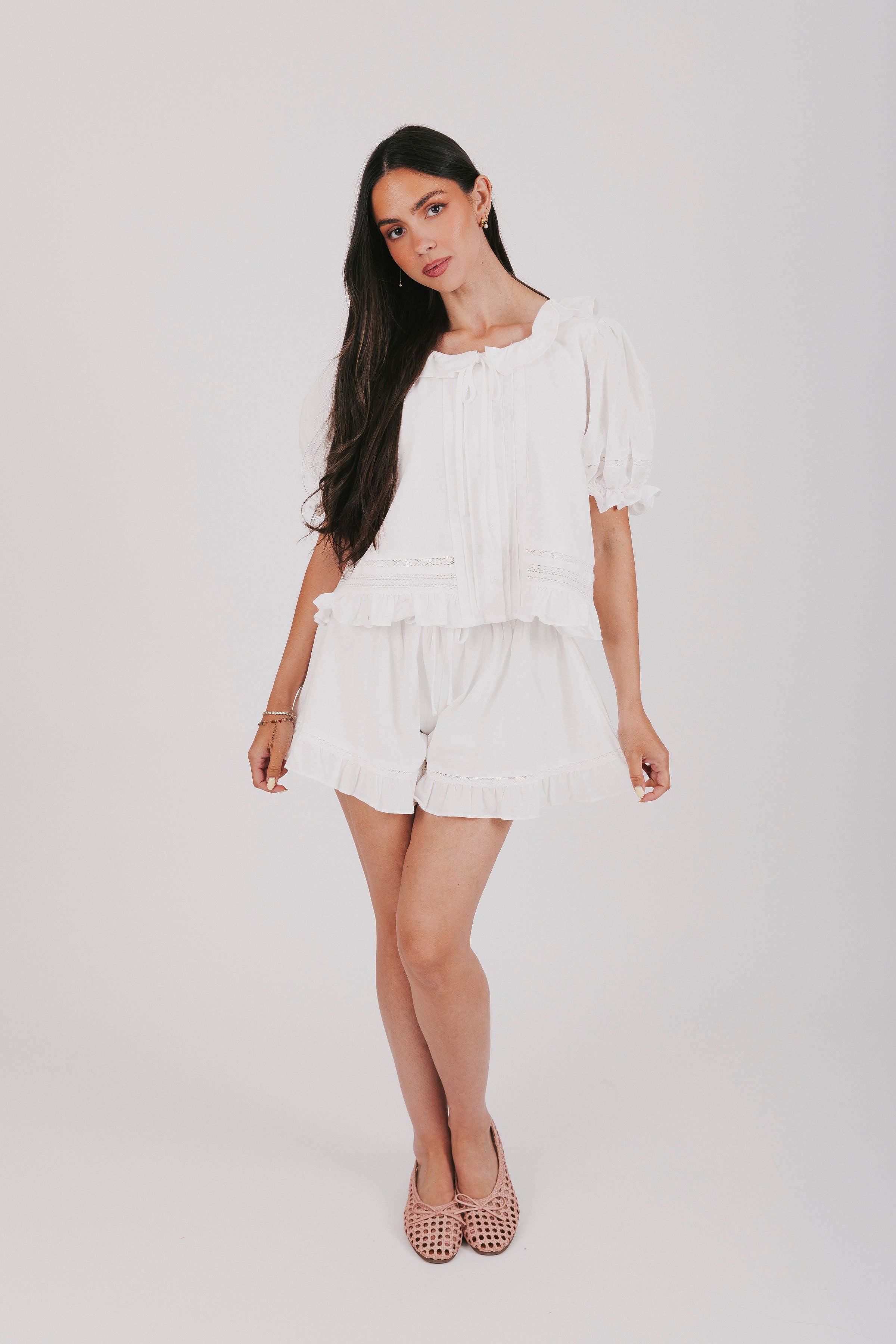 White top and shorts set with a puff sleeve blouse and elastic waistband shorts 