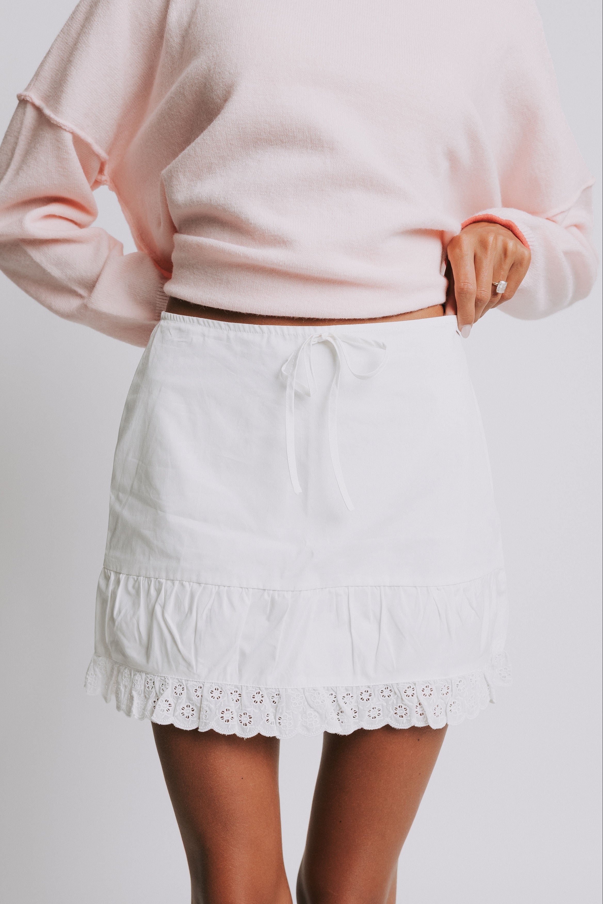 white mini skirt with eyelet lace trim 