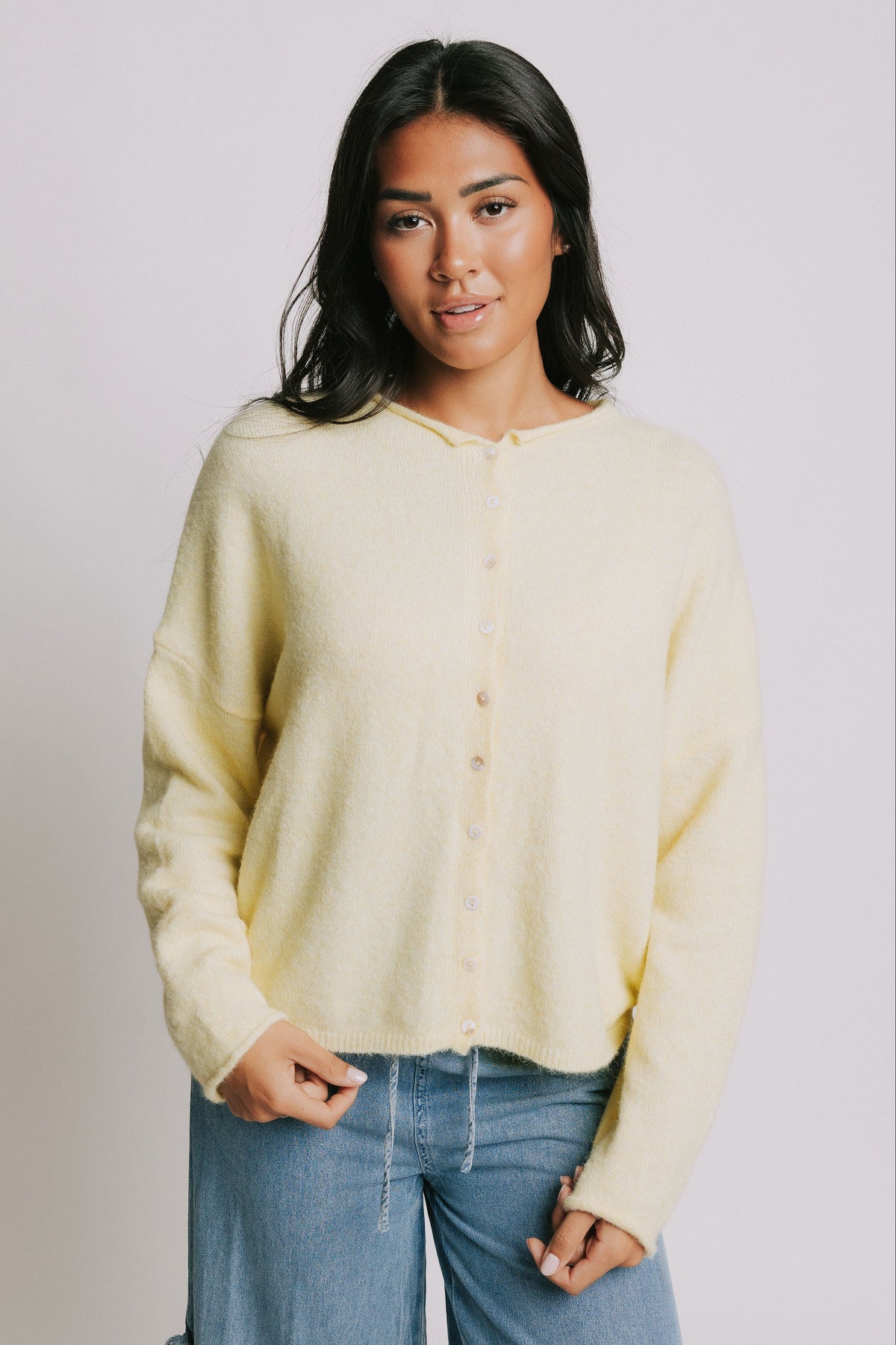 yellow heathered cardigan with rolled edges 
