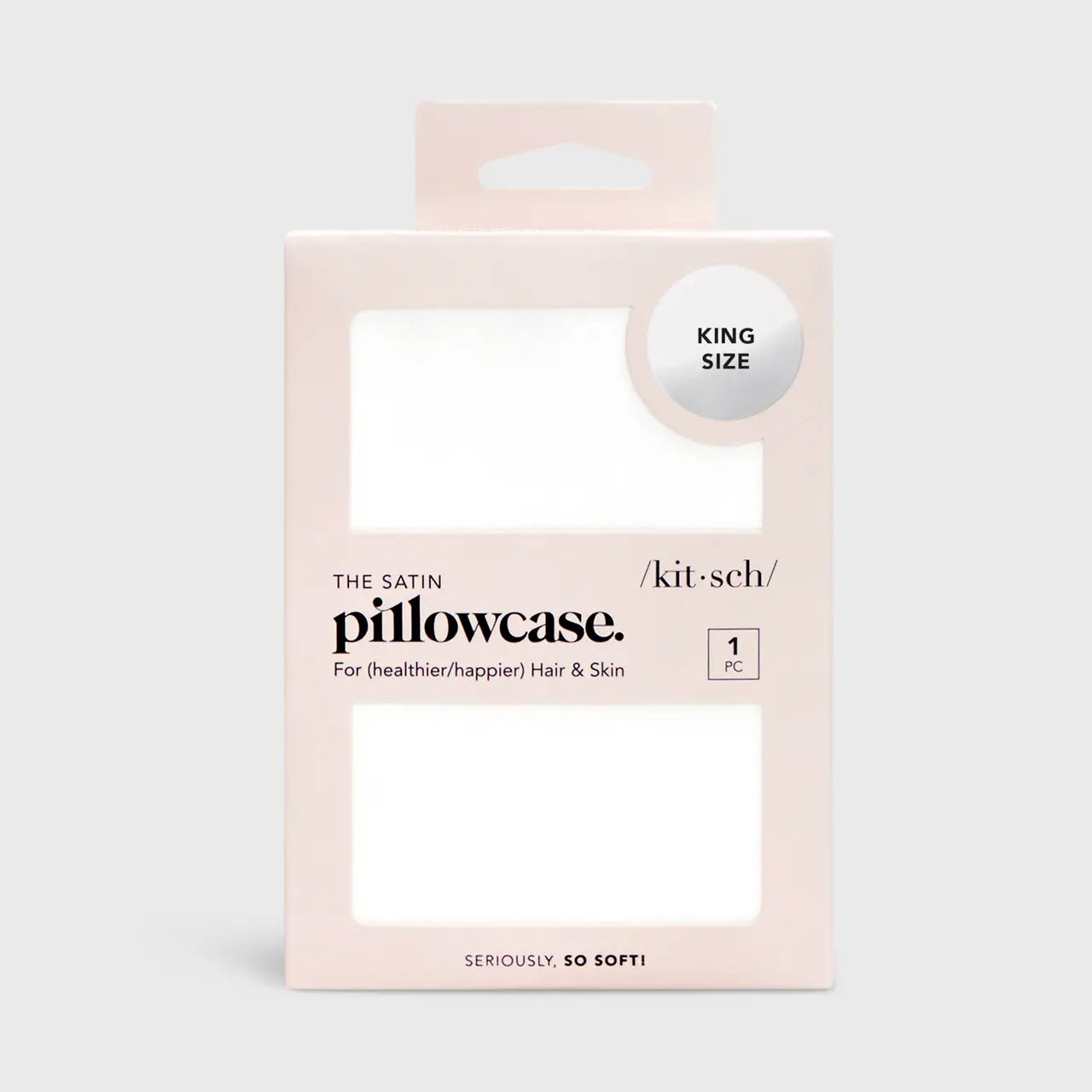 Package of satin pillowcase with 'kit-sch' branding on a light gray background